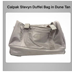 Calpak Stevyn Duffel Bag in Dune Tan - aka Grey